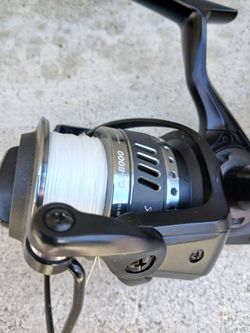 Fishing reels and rod lot