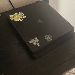 ps4 with 2 controllers and power cord