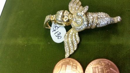 Gold over sterling silver. 925