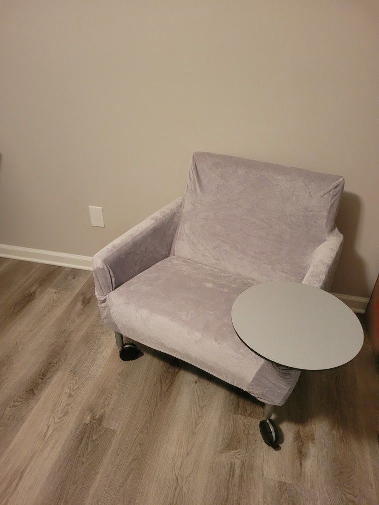 Chair With rolls and attached side table