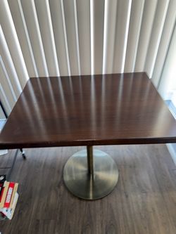 Small brown dining table wood