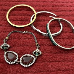 lot of bracelets- Michael Kors, Kate Spade, one vintage, some stamped 925.  $10 for the lot