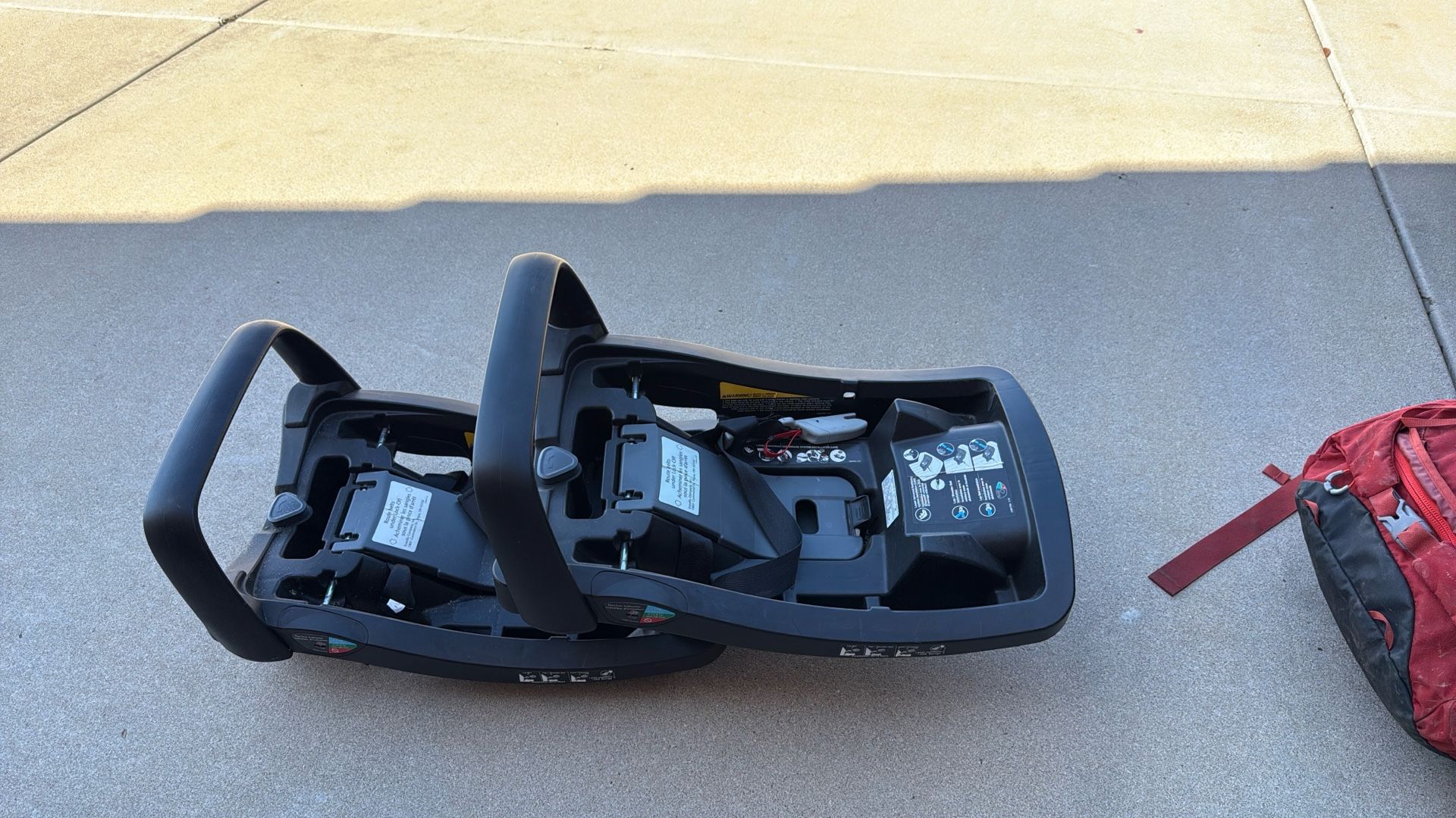 Two Car Seat Bases. 