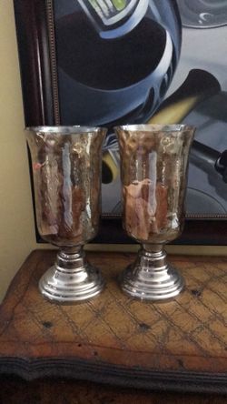 2 large glass hurricane candle holders $35