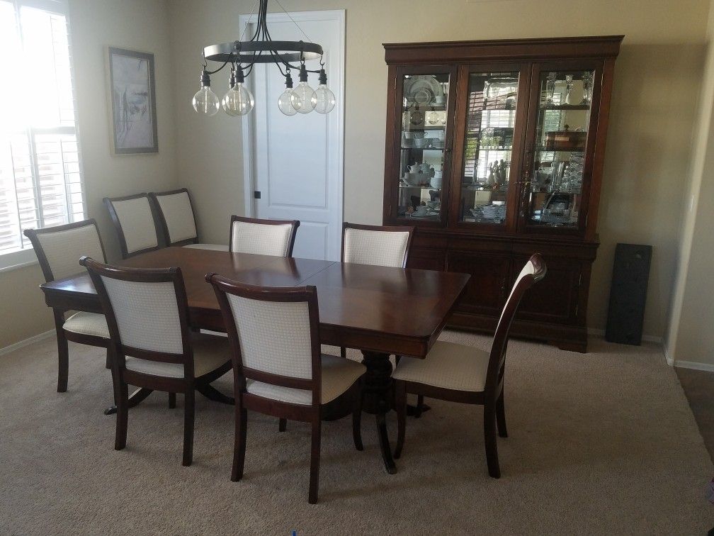 Dining room table, chairs, and hutch