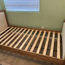 Twin bed frame and Free mattress with mattress pads.