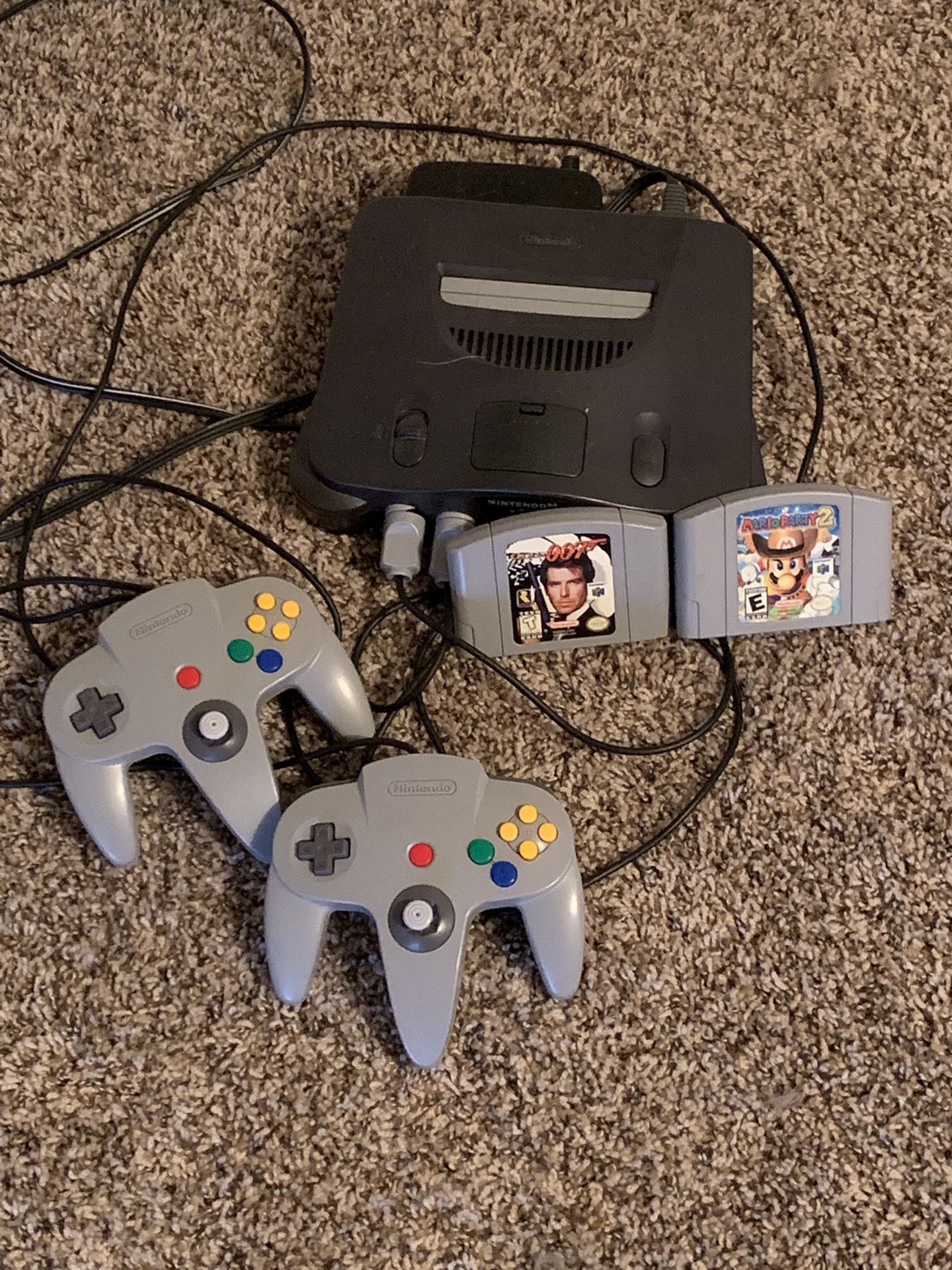 Nintendo 64 plus 2 controllers and games