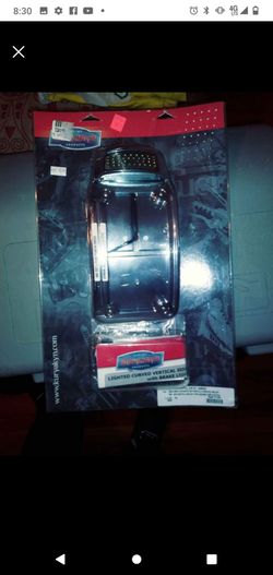 License plate holder with light