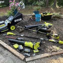 Ryobi 40 V 20“ self-propelled lawnmower, string, trimmer, leaf blower pole saw leaf vacuum hedge trimmer attachment two batteries, two chargers used 4