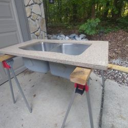 Elkay double 10" deep Kitchen sink( new) mounted in 23" x44" pc. granite,