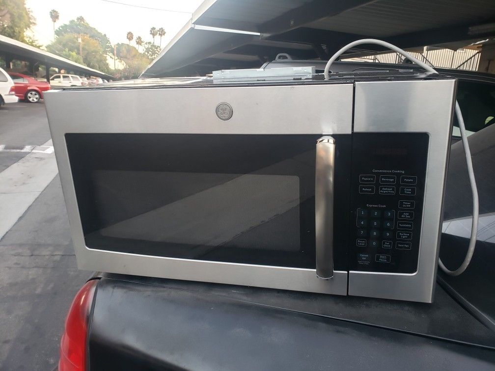 GE. Over-the-Range Microwave (Stainless Steel