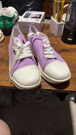 Ladies purple pair of sneakers