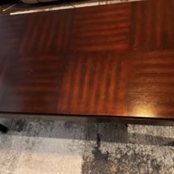 Dark cherry wood rooms to go coffee table great condition! 