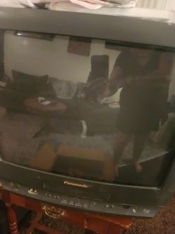 Old school TV with built in vcr and vhs tapes