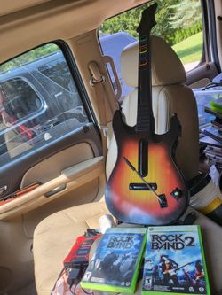 Xbox 360 guitar hero guitar controller and 2 games
RockBand 1 And RockBand 2