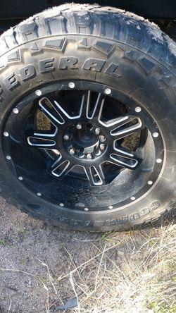 20in Chevy wheels/35 muds