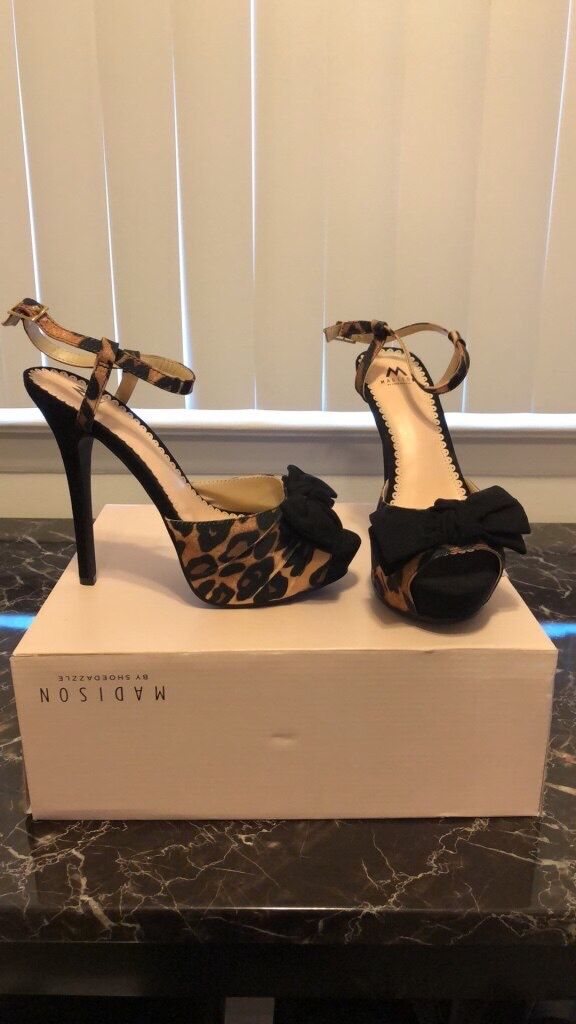 BRAND NEW Leopard print with black bow heels size 8 1/2