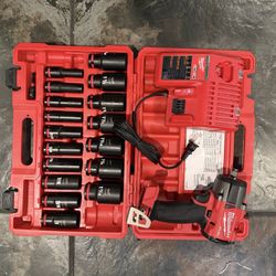 Milwaukee 1/2" Mid-Torque Impact Wrench With Socket Set and Charger 