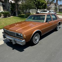 1977 Chevy Impala V8 350 with automatic transmission. It is a one owner all original garage kept it is grandma‘s car would 77,000 original miles has n