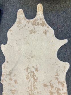 Faux cow hide rug