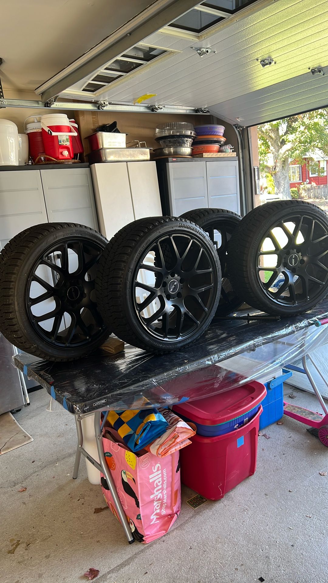 Four brand new Bridgestone tires with wheels