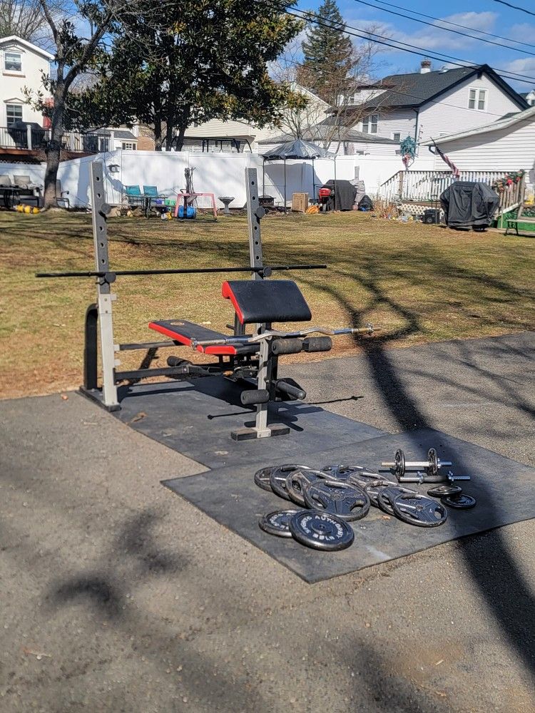 Golds Gym Bench Rack Set w/ 255 lbs barbell curl bar dumbells - Can deliver and install