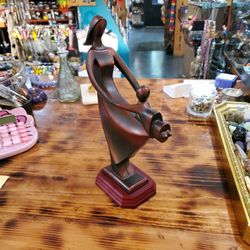 Woman and Child Statue