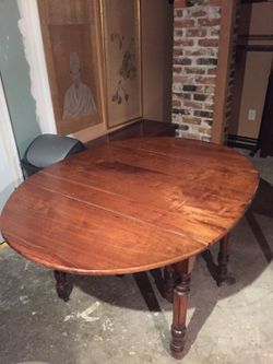 Vintage kitchen table on casters with 2 leaves