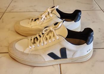 Veja V-12 sneakers feature a white leather and mesh upper with a prominent black logo size 12 Men's