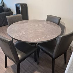 Marble top circle dining room set