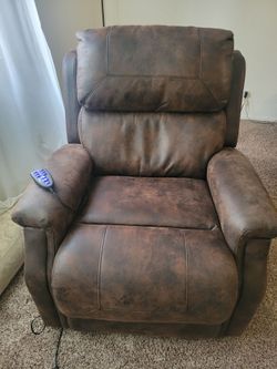 Dark brown electric recliner with heat setting