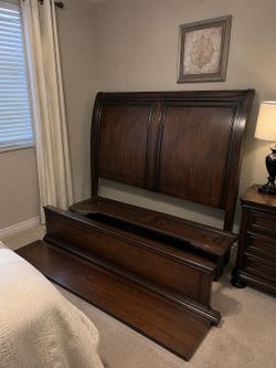 Trellington Brown King Sleigh Storage Bed