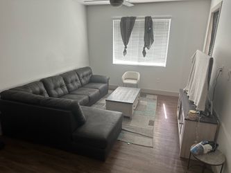 Couch, coffee table, fireplace/entertainment center
