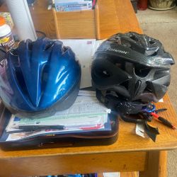 2 Helmets One Is Swinn Adult Helmet Price 5 each. Pin P 