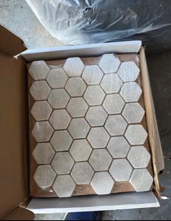 13 sheets of shower floor tile and backsplash