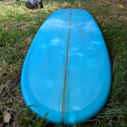 9’4” lightly used fiberglass surfboard