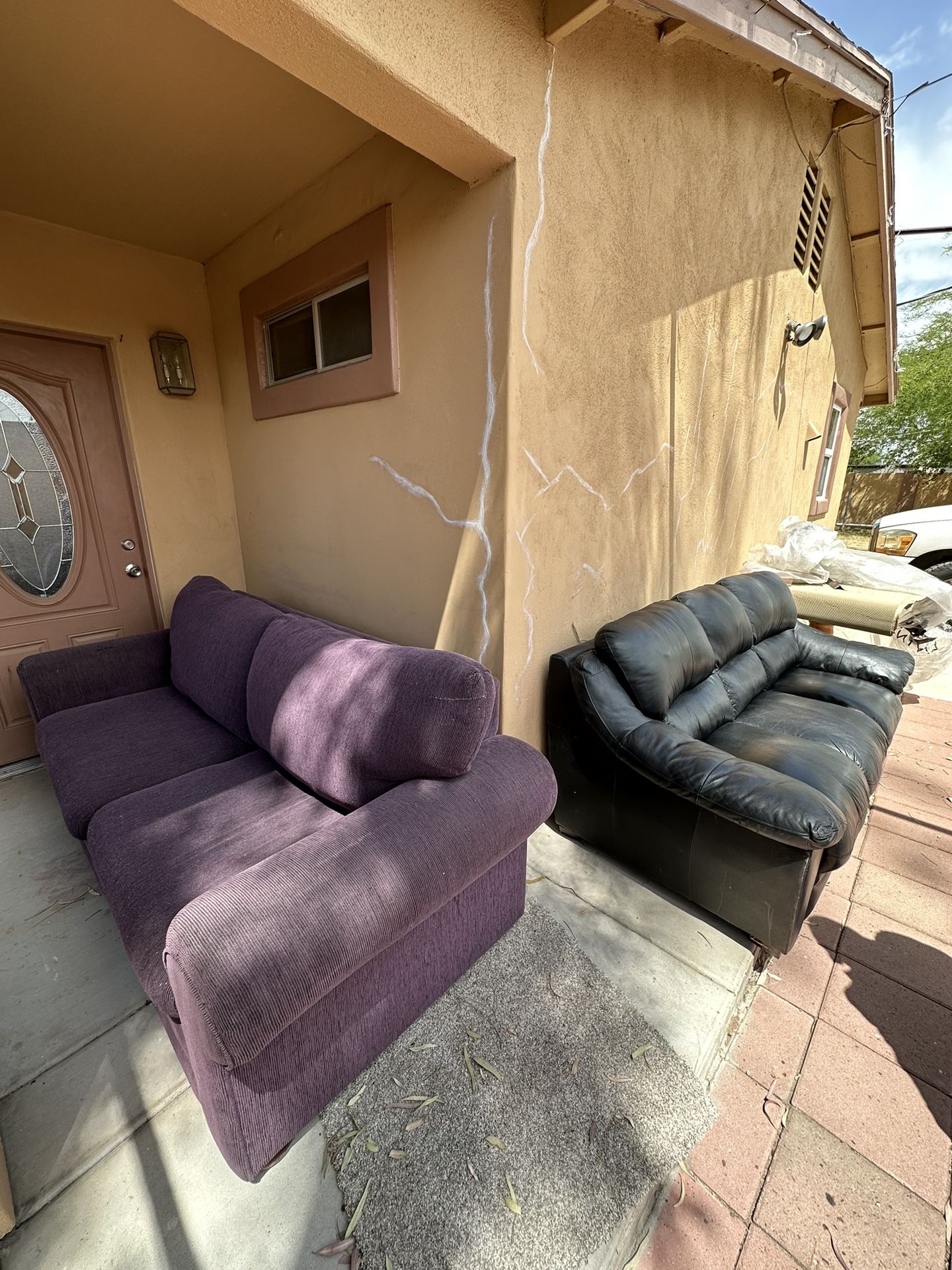2 couches, one is sofa bed