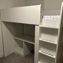 White IKEA store bunkbed with lower desk study area