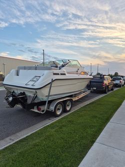 Cabin Cruiser Boat with Trailer