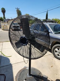 Industrial fan with miss sprayer.