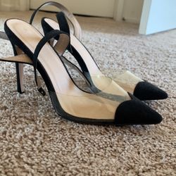 Black and clear pointy toe heels