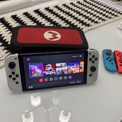 Nintendo Switch OLED W/ Mario Case And Extra Joycons
