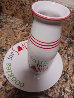 Two Sets Of Cookies And Milk For Santa