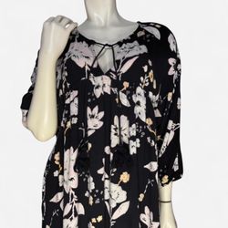 Black floral print billabong short dress with tie front and bell sleeves