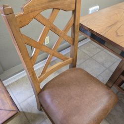 Solid Wood Dining Table With 4 Chairs Table Measures 42 X 60 Inches I'm Asking  $ 250 For Them