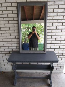 Old Vintage mirror ( 3 1/2 by 2) with Table 3 1/2 high by 14 inches width by 3 ft length asking $100 for both pieces