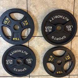 Four 35lb Olympic plates