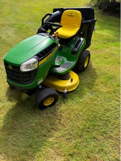 John Deere D120 21hp with 42 inch deck and bagger
