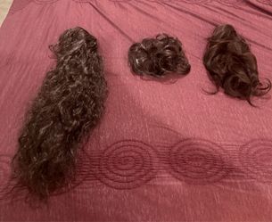 Various female hair dark brown curly ponytail and bun pieces