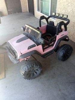 Pink power wheels jeep